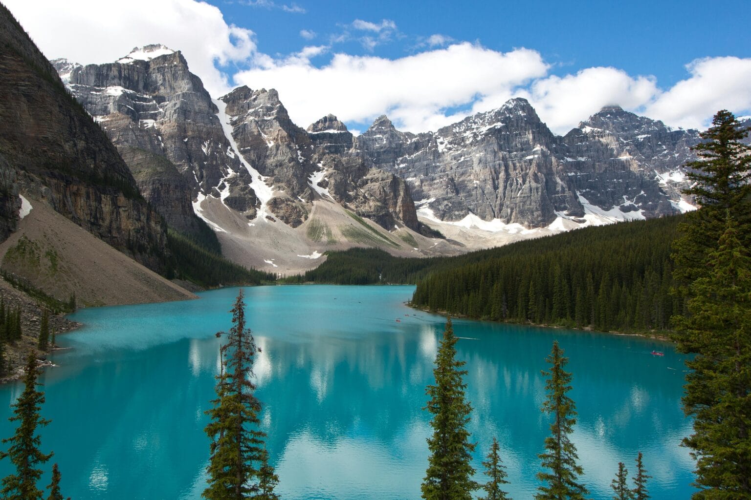 Stunning image of Moraine Lake with reflections of the Rocky Mountains in Alberta, Canada.